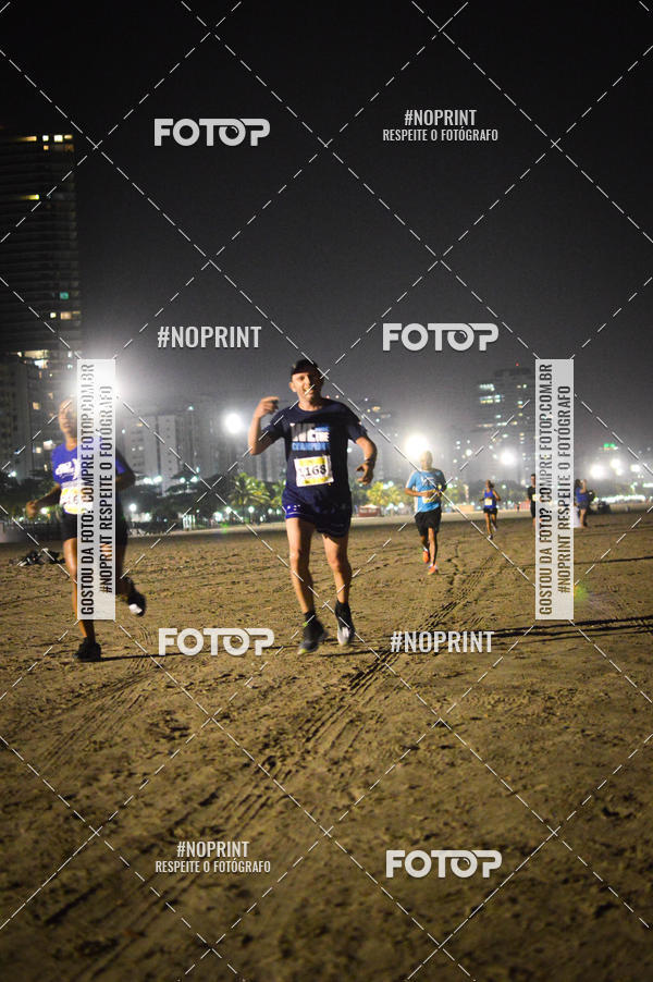 Buy your photos of the eventJovem Pan Night Run Santos on Fotop