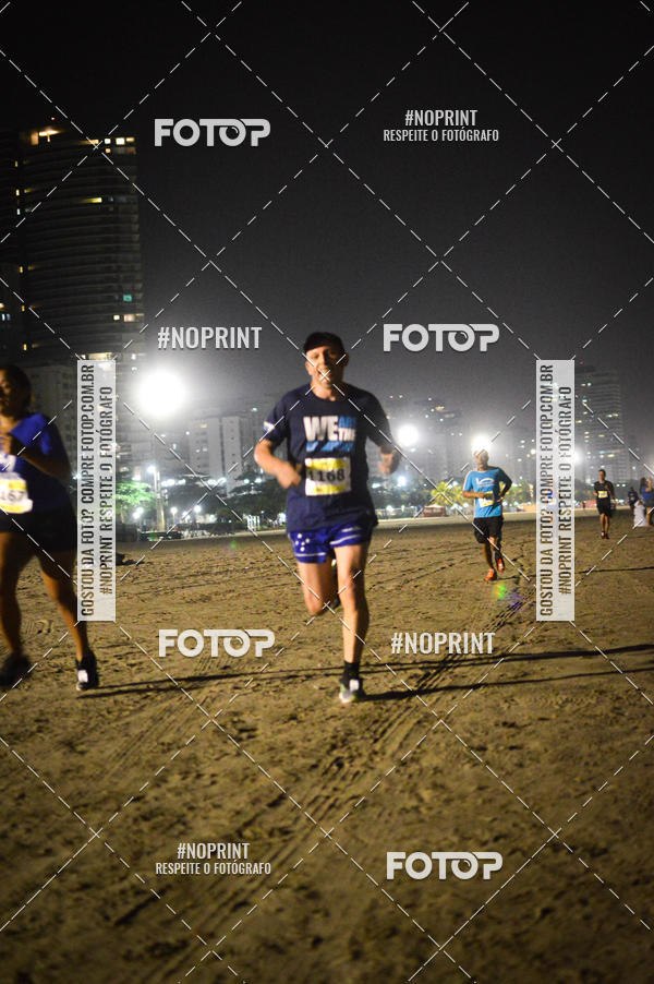 Buy your photos of the eventJovem Pan Night Run Santos on Fotop