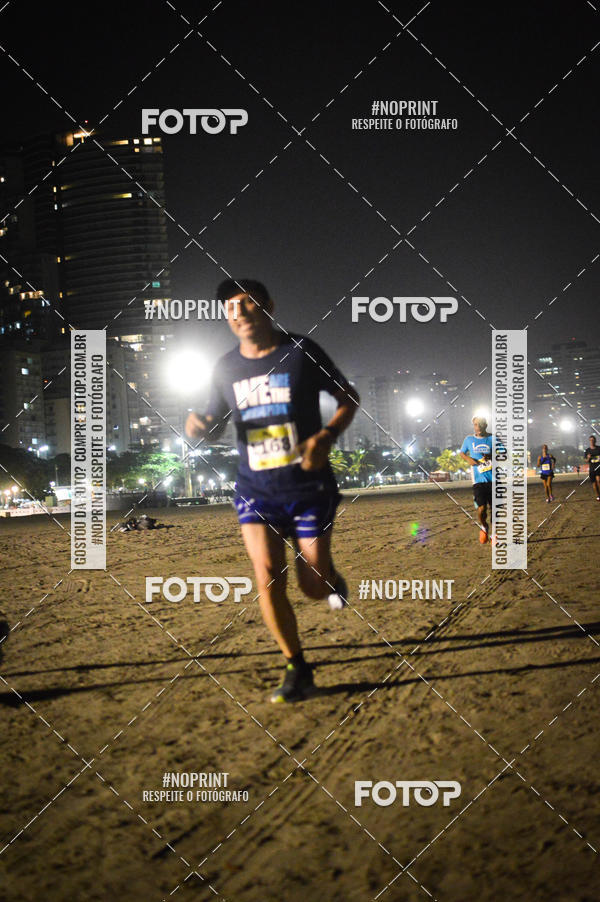Buy your photos of the eventJovem Pan Night Run Santos on Fotop