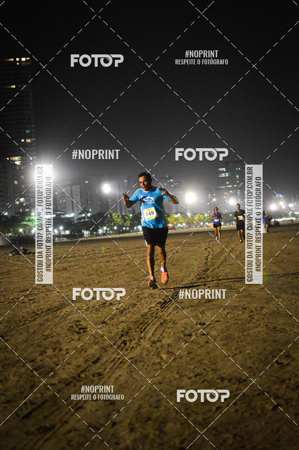 Buy your photos of the eventJovem Pan Night Run Santos on Fotop