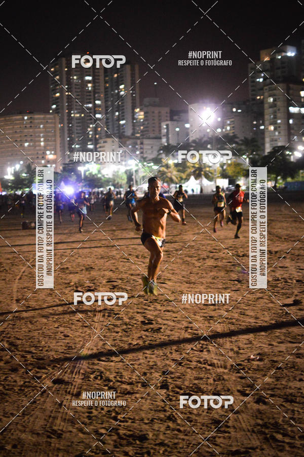 Buy your photos of the eventJovem Pan Night Run Santos on Fotop