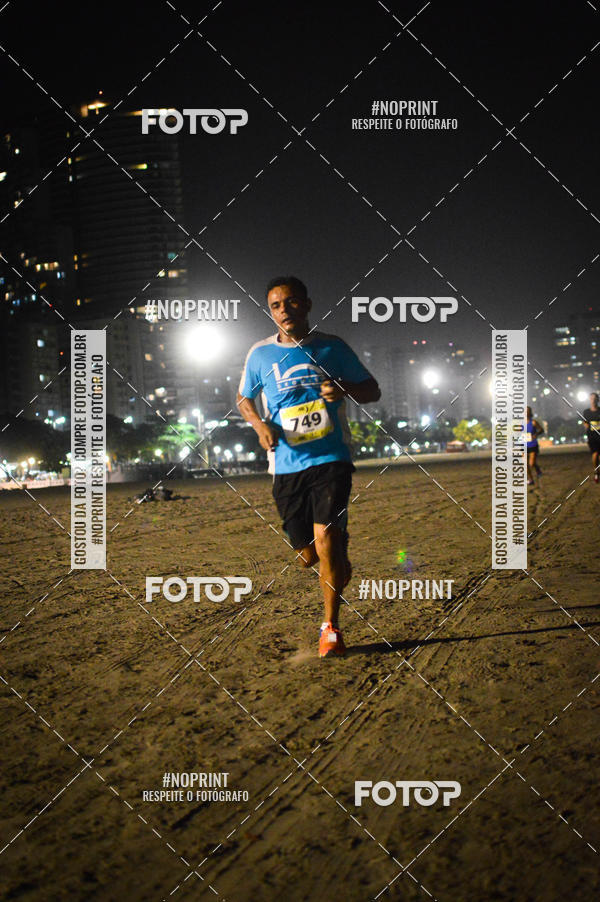 Buy your photos of the eventJovem Pan Night Run Santos on Fotop