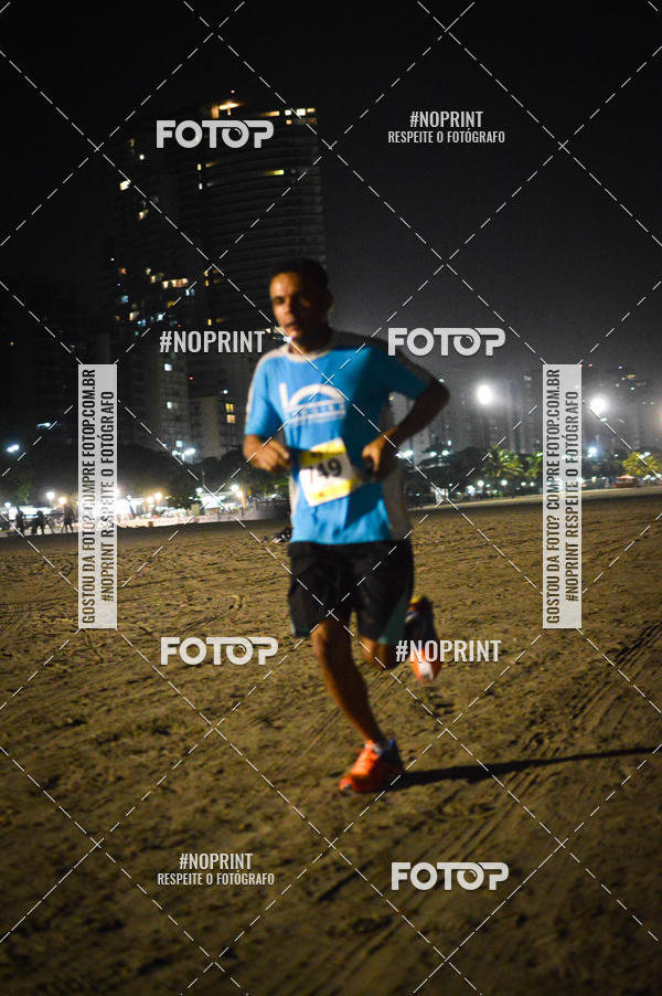 Buy your photos of the eventJovem Pan Night Run Santos on Fotop