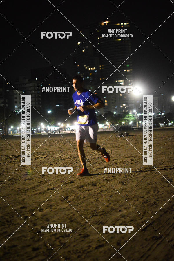 Buy your photos of the eventJovem Pan Night Run Santos on Fotop