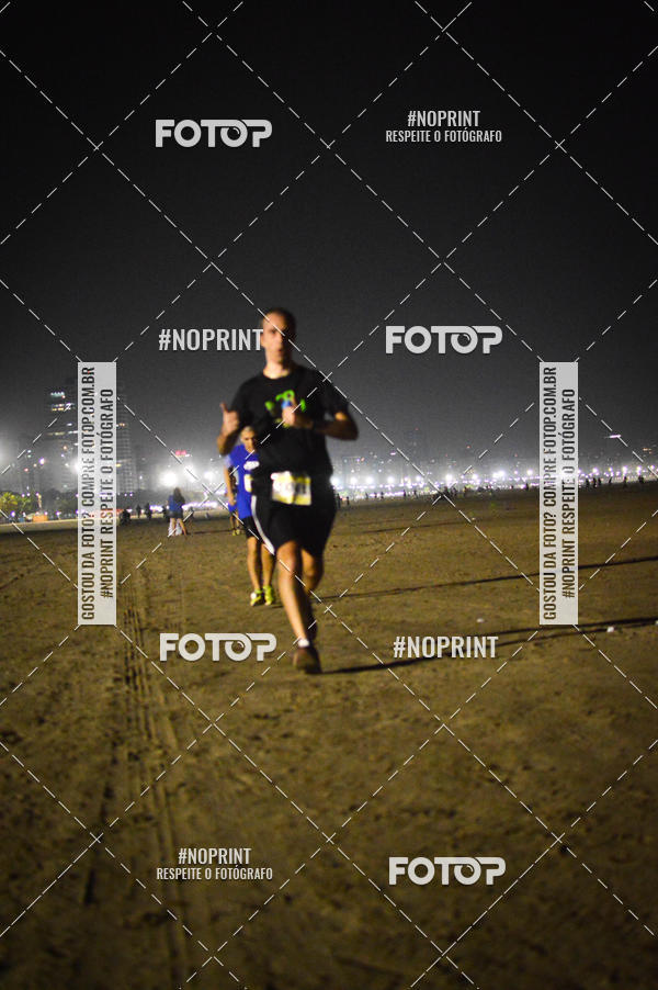 Buy your photos of the eventJovem Pan Night Run Santos on Fotop