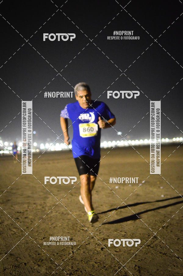 Buy your photos of the eventJovem Pan Night Run Santos on Fotop