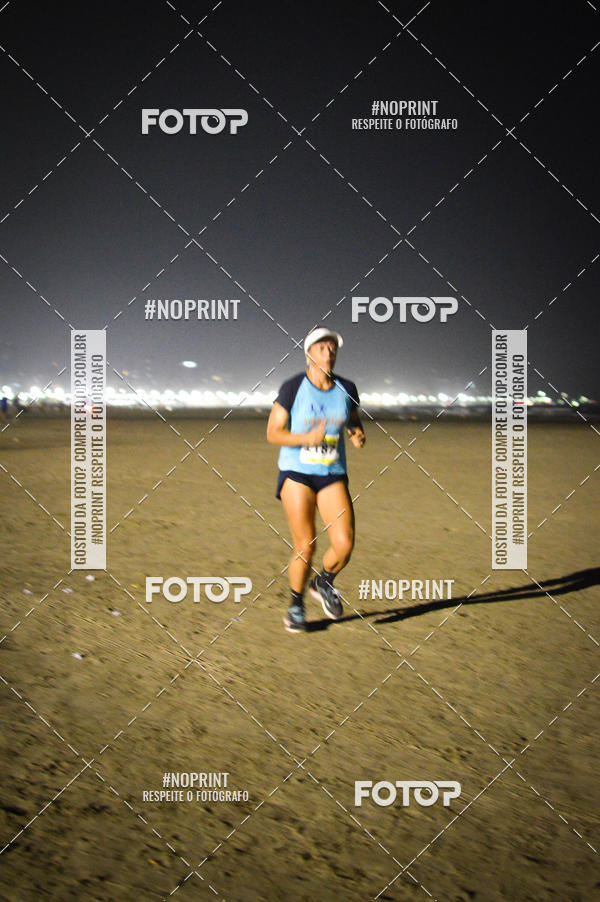 Buy your photos of the eventJovem Pan Night Run Santos on Fotop