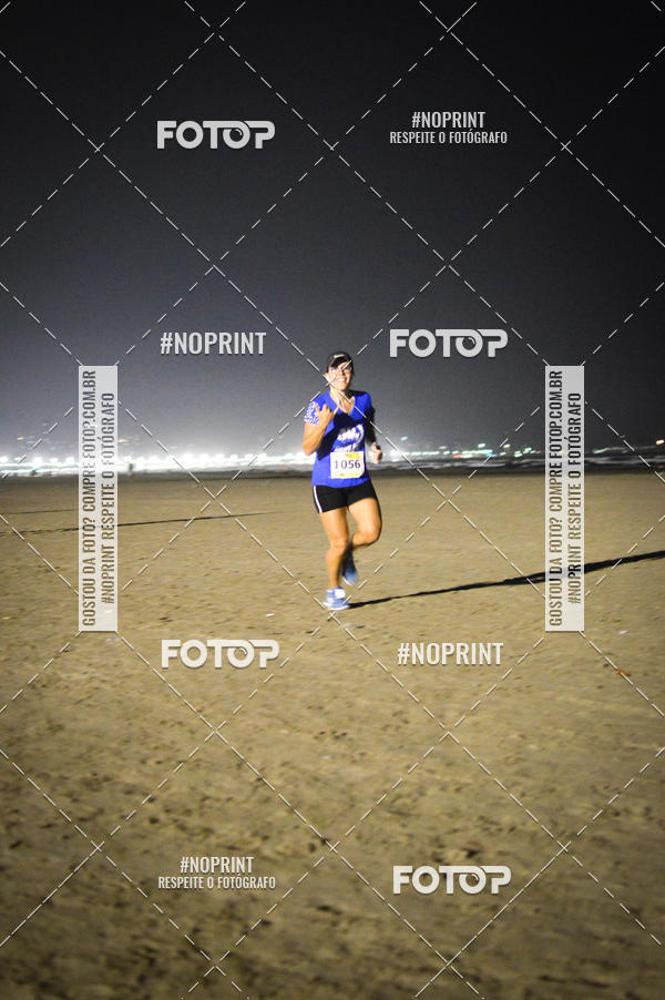 Buy your photos of the eventJovem Pan Night Run Santos on Fotop