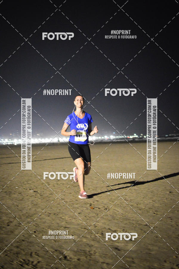 Buy your photos of the eventJovem Pan Night Run Santos on Fotop
