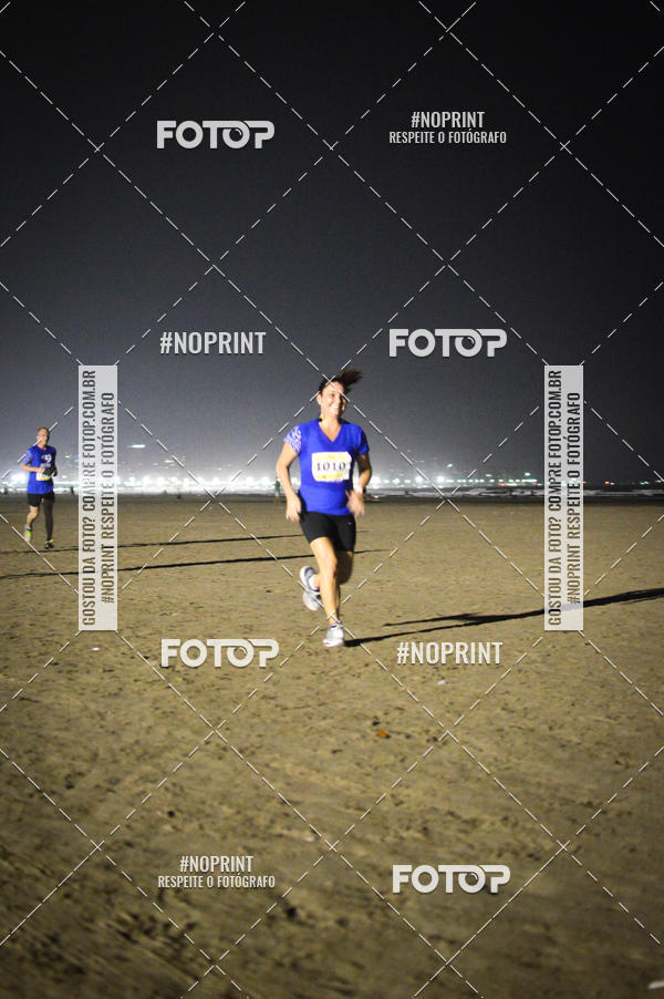 Buy your photos of the eventJovem Pan Night Run Santos on Fotop