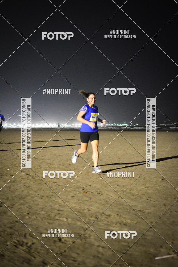Buy your photos of the eventJovem Pan Night Run Santos on Fotop