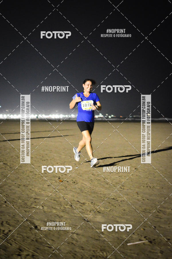 Buy your photos of the eventJovem Pan Night Run Santos on Fotop