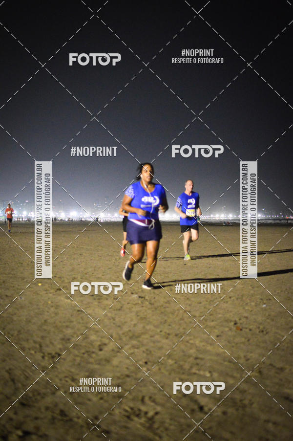 Buy your photos of the eventJovem Pan Night Run Santos on Fotop