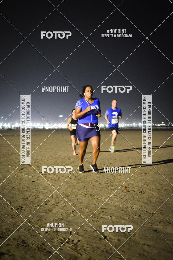 Buy your photos of the eventJovem Pan Night Run Santos on Fotop
