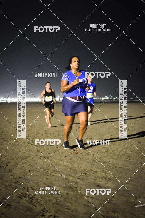 Buy your photos of the eventJovem Pan Night Run Santos on Fotop