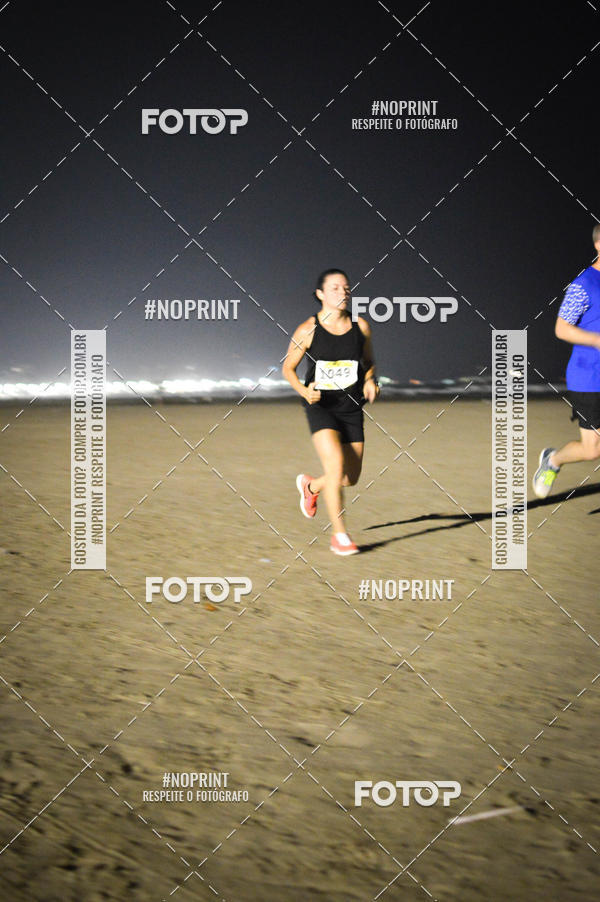 Buy your photos of the eventJovem Pan Night Run Santos on Fotop