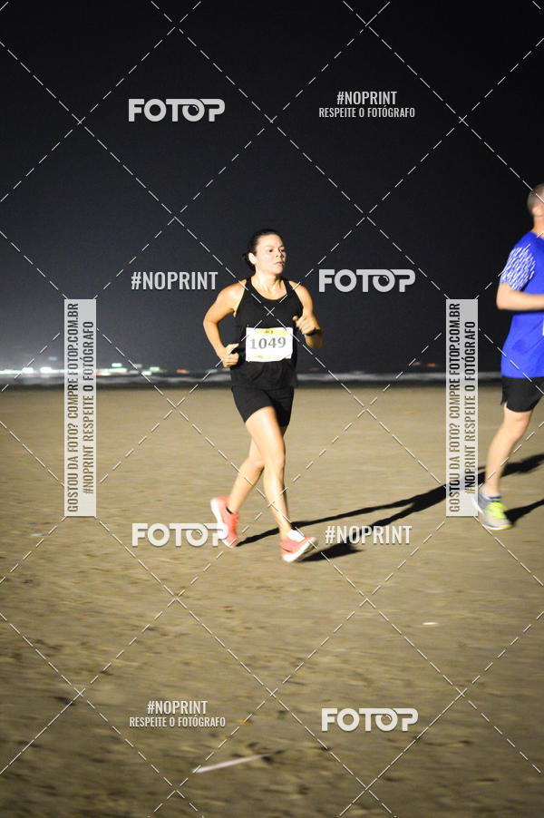 Buy your photos of the eventJovem Pan Night Run Santos on Fotop