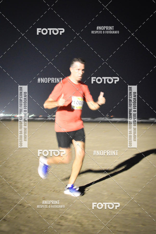 Buy your photos of the eventJovem Pan Night Run Santos on Fotop