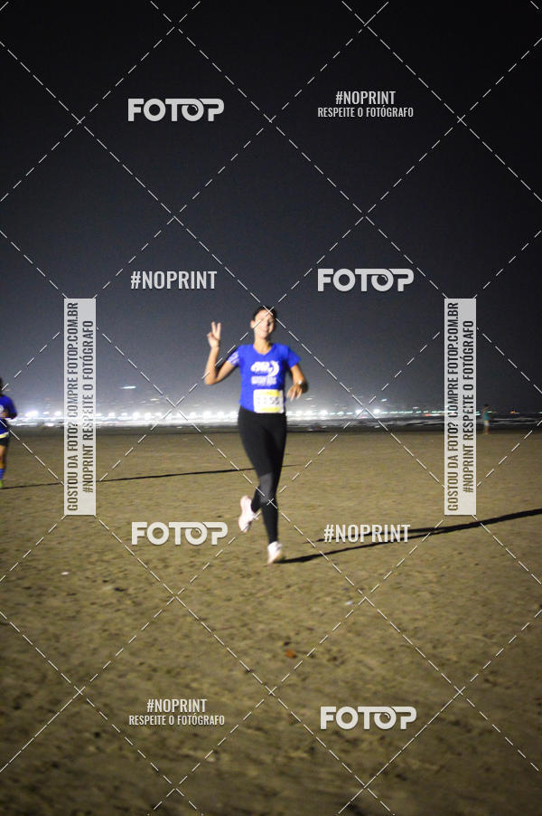 Buy your photos of the eventJovem Pan Night Run Santos on Fotop