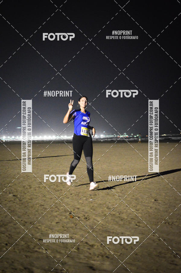 Buy your photos of the eventJovem Pan Night Run Santos on Fotop