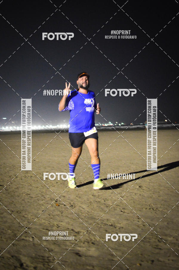 Buy your photos of the eventJovem Pan Night Run Santos on Fotop