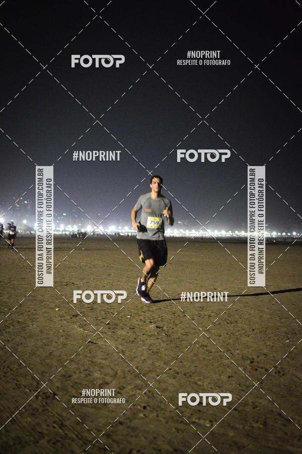 Buy your photos of the eventJovem Pan Night Run Santos on Fotop