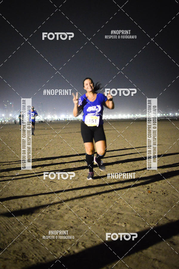 Buy your photos of the eventJovem Pan Night Run Santos on Fotop