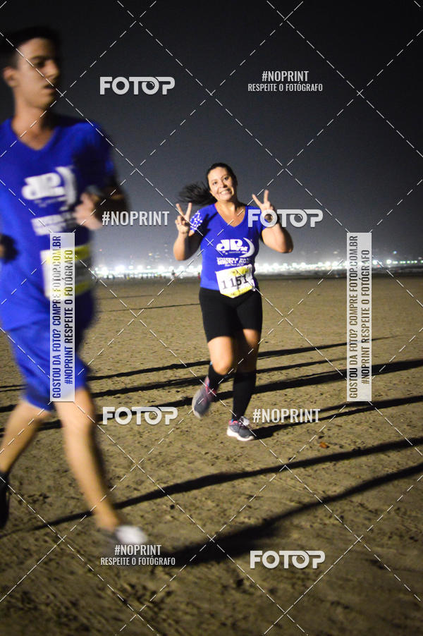 Buy your photos of the eventJovem Pan Night Run Santos on Fotop