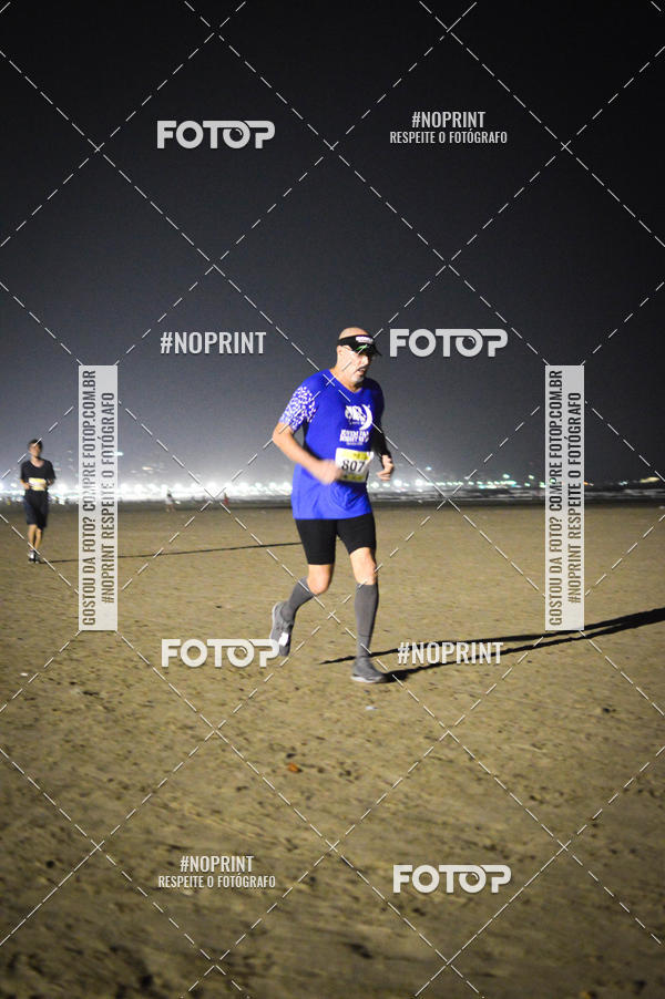 Buy your photos of the eventJovem Pan Night Run Santos on Fotop