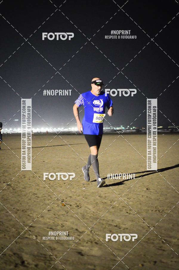 Buy your photos of the eventJovem Pan Night Run Santos on Fotop