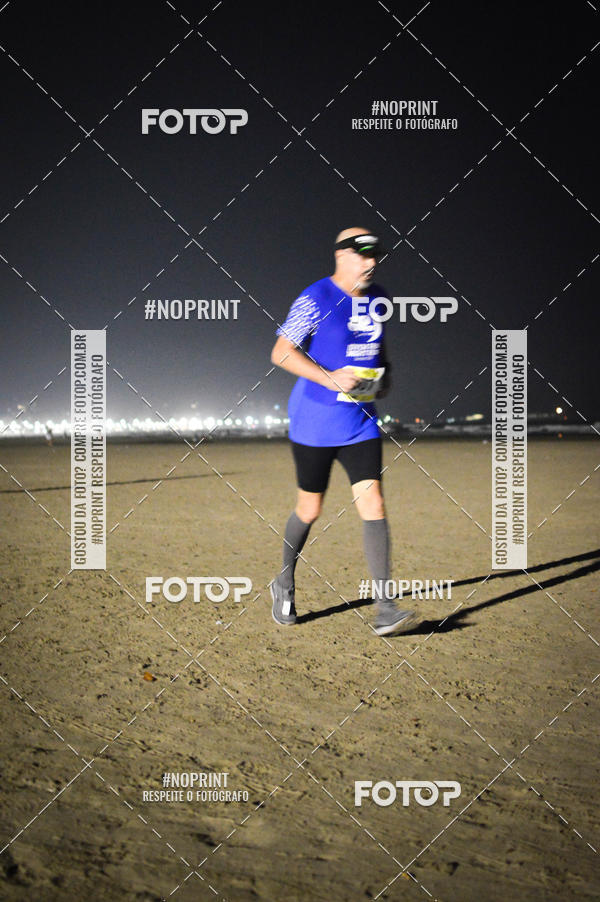 Buy your photos of the eventJovem Pan Night Run Santos on Fotop
