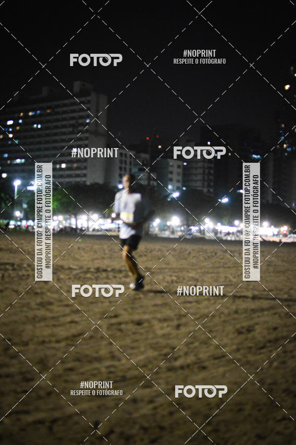 Buy your photos of the eventJovem Pan Night Run Santos on Fotop