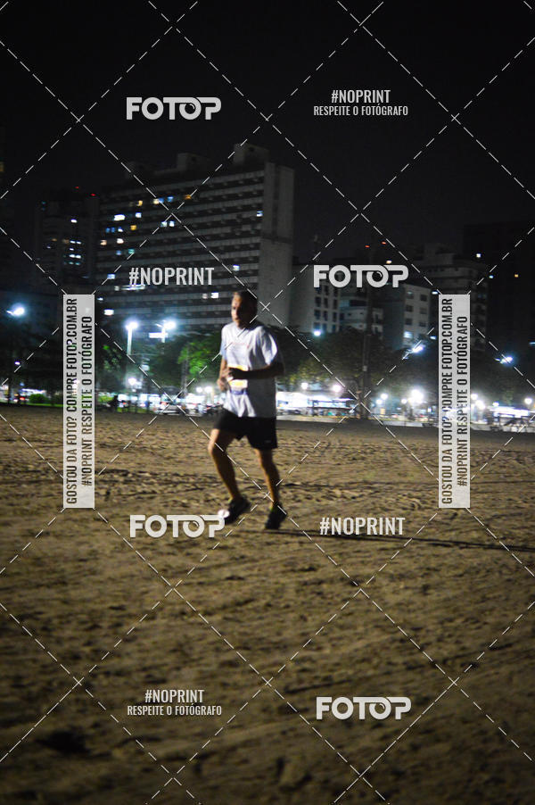 Buy your photos of the eventJovem Pan Night Run Santos on Fotop