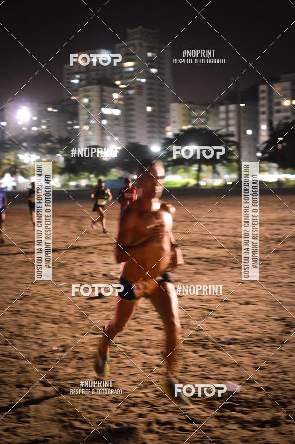 Buy your photos of the eventJovem Pan Night Run Santos on Fotop