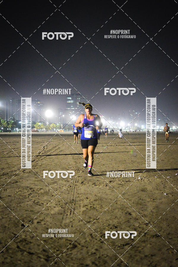 Buy your photos of the eventJovem Pan Night Run Santos on Fotop