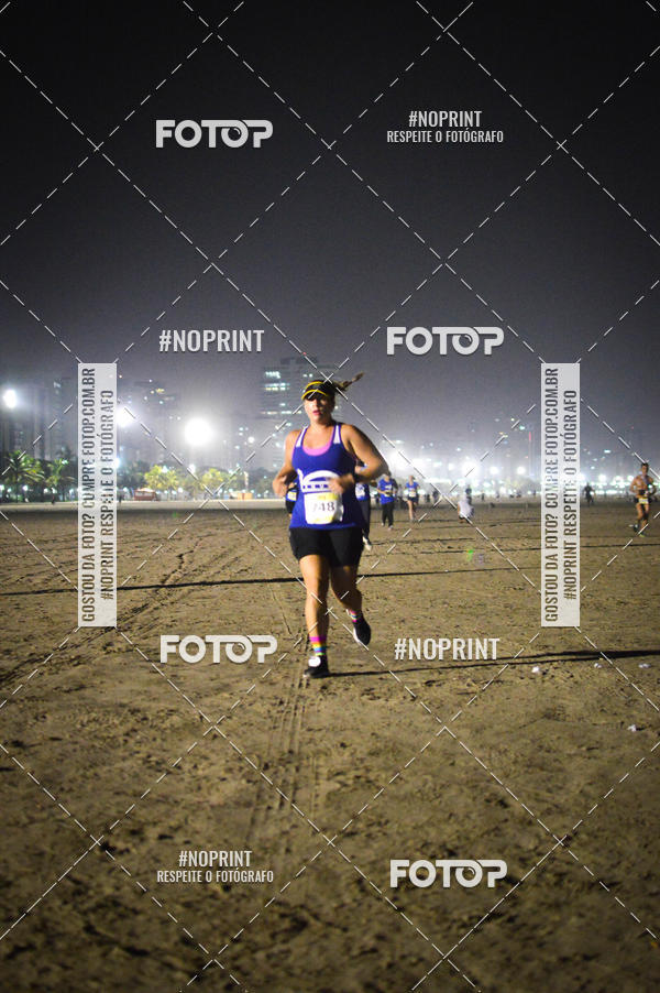 Buy your photos of the eventJovem Pan Night Run Santos on Fotop