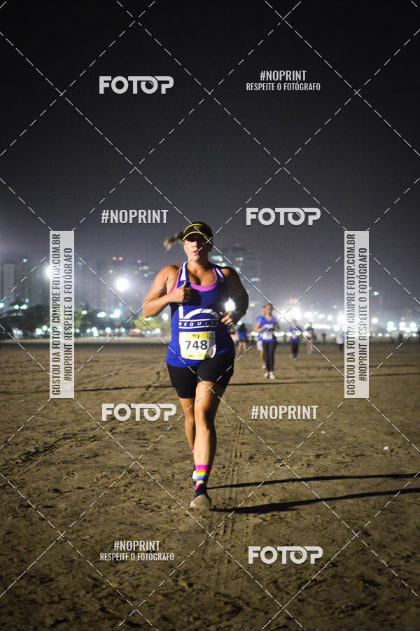Buy your photos of the eventJovem Pan Night Run Santos on Fotop