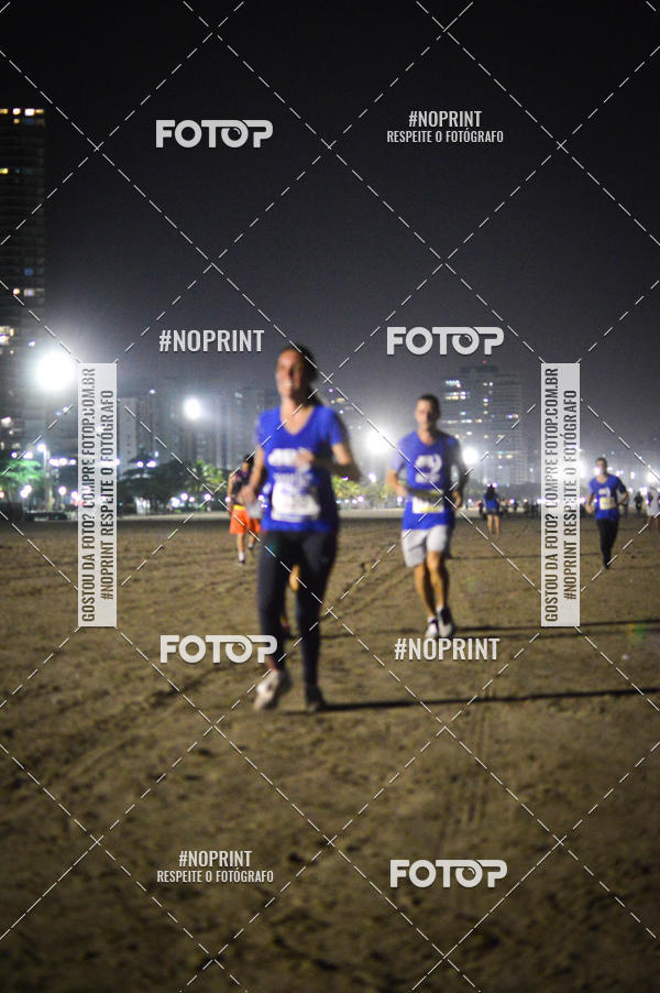 Buy your photos of the eventJovem Pan Night Run Santos on Fotop