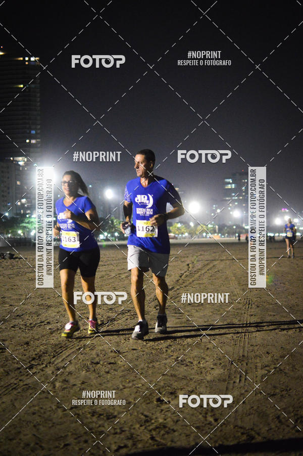 Buy your photos of the eventJovem Pan Night Run Santos on Fotop