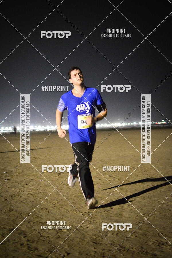 Buy your photos of the eventJovem Pan Night Run Santos on Fotop
