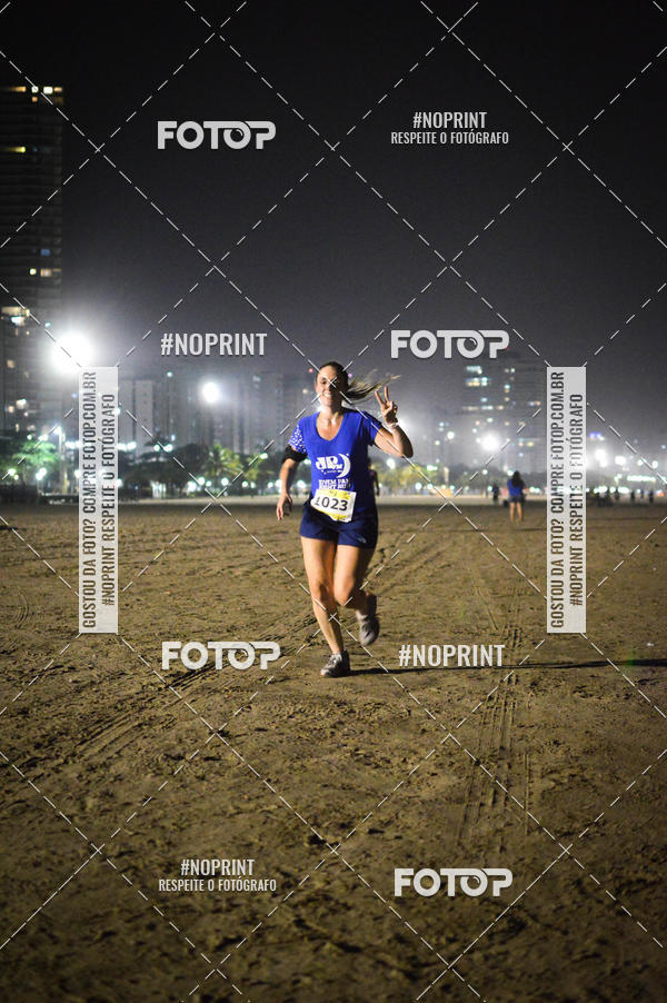 Buy your photos of the eventJovem Pan Night Run Santos on Fotop