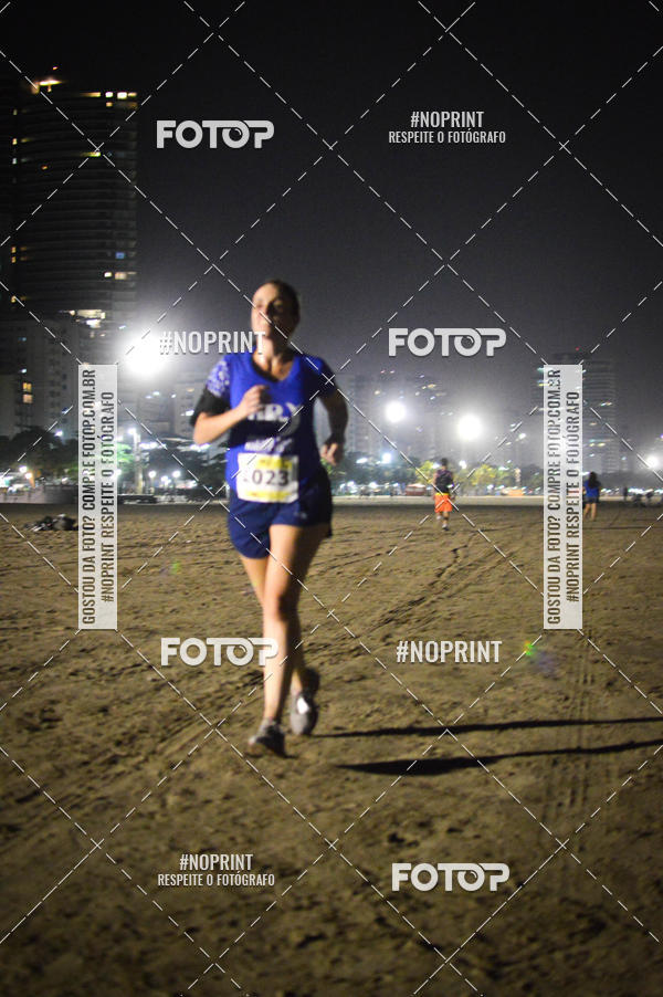 Buy your photos of the eventJovem Pan Night Run Santos on Fotop
