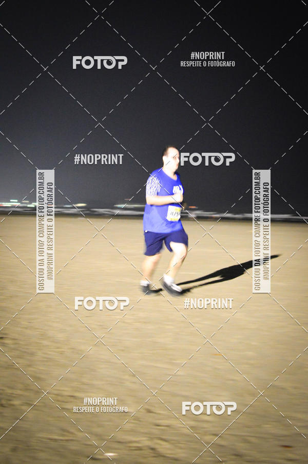 Buy your photos of the eventJovem Pan Night Run Santos on Fotop