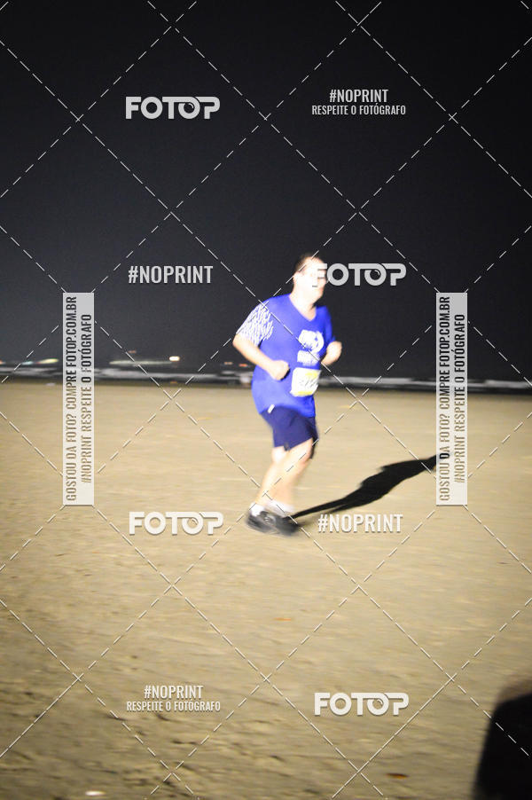 Buy your photos of the eventJovem Pan Night Run Santos on Fotop