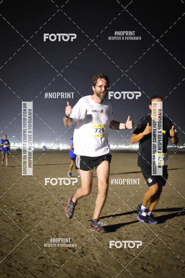 Buy your photos of the eventJovem Pan Night Run Santos on Fotop