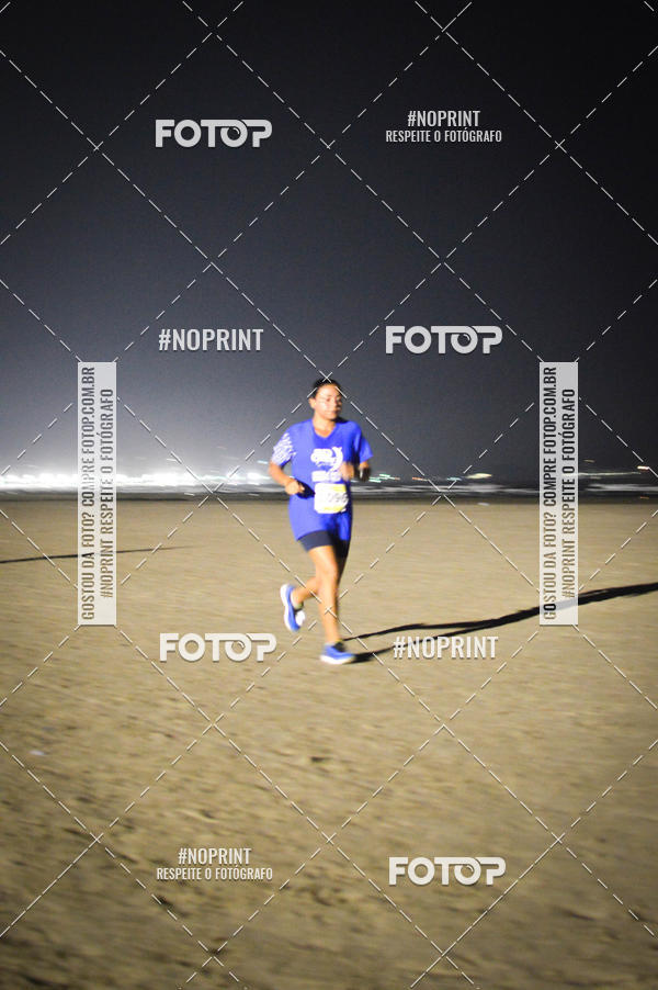 Buy your photos of the eventJovem Pan Night Run Santos on Fotop