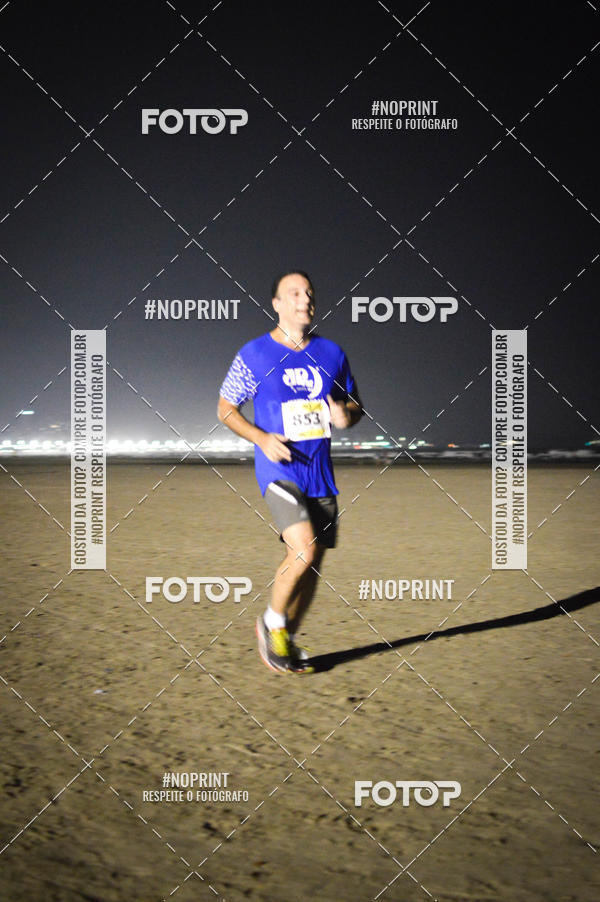 Buy your photos of the eventJovem Pan Night Run Santos on Fotop