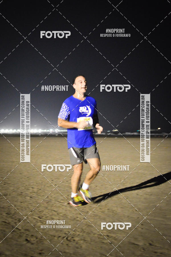Buy your photos of the eventJovem Pan Night Run Santos on Fotop