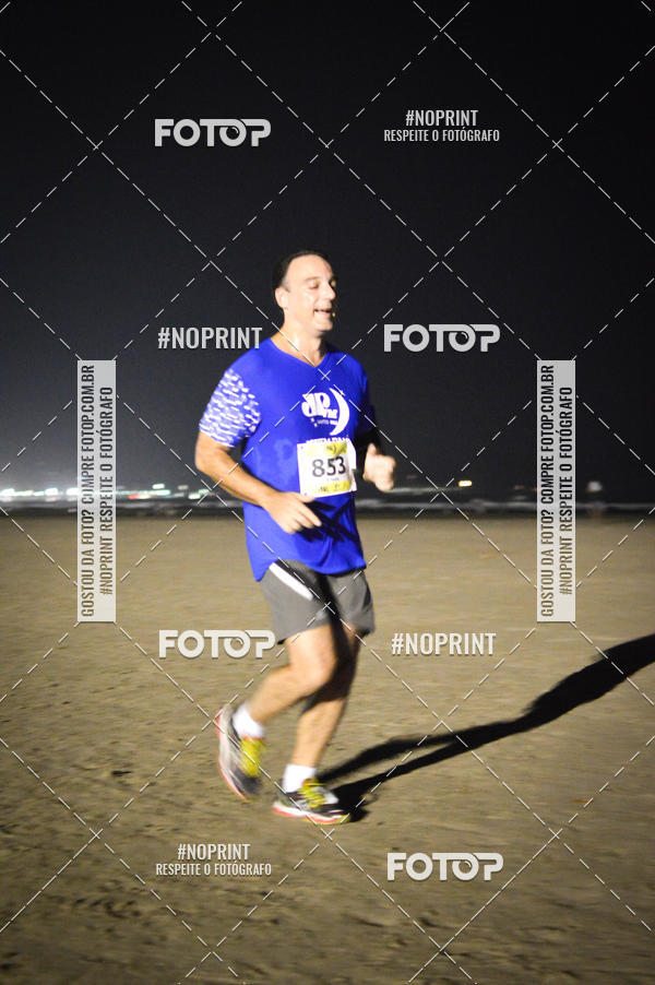 Buy your photos of the eventJovem Pan Night Run Santos on Fotop