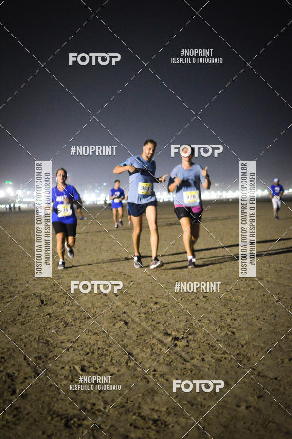 Buy your photos of the eventJovem Pan Night Run Santos on Fotop
